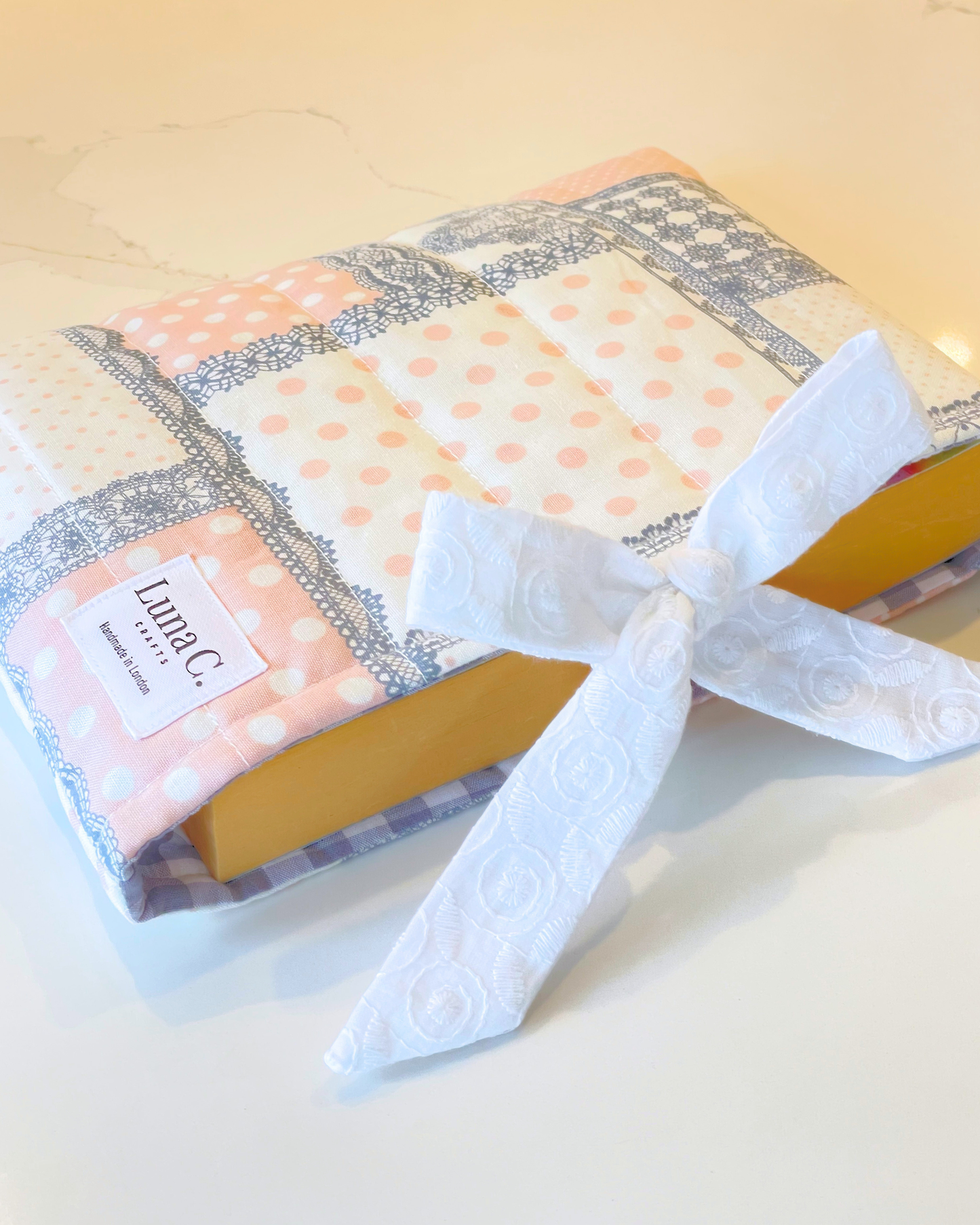 Pink and Grey Patchwork Pattern Ribbon Tied Book Sleeve