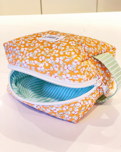 Orange with White Floral Pattern Makeup Bag - Regular Size