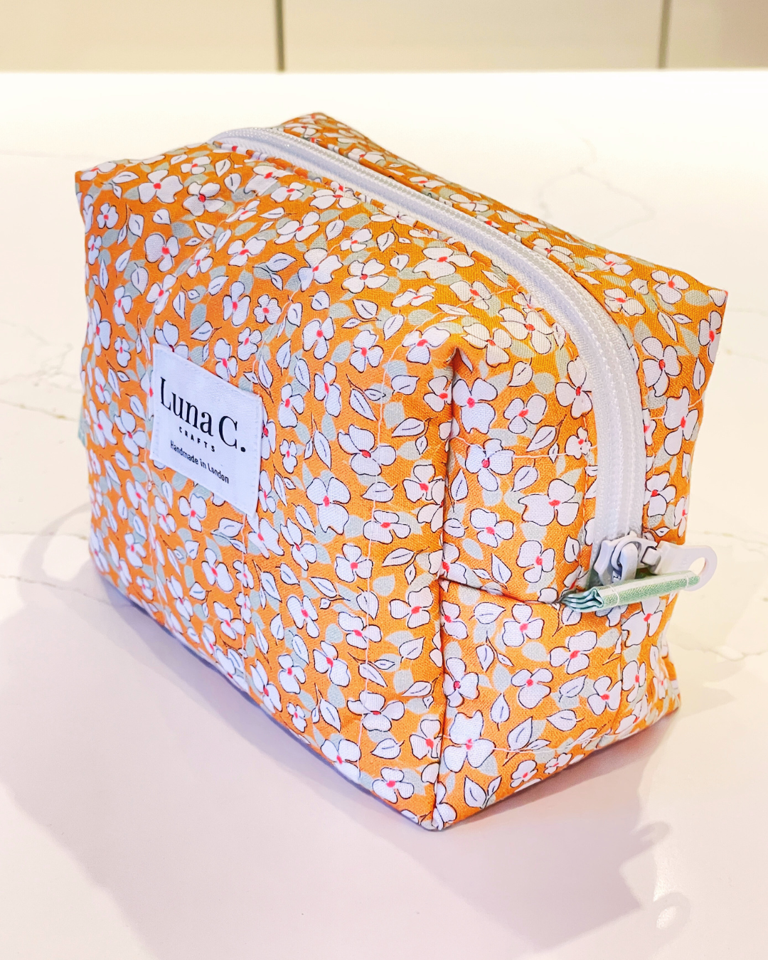 Orange with White Floral Pattern Makeup Bag - Regular Size